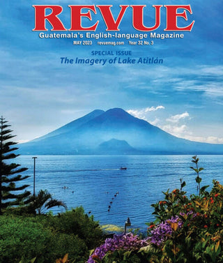 Magazine cover featuring Lake Atitlán with a mountain in the background
